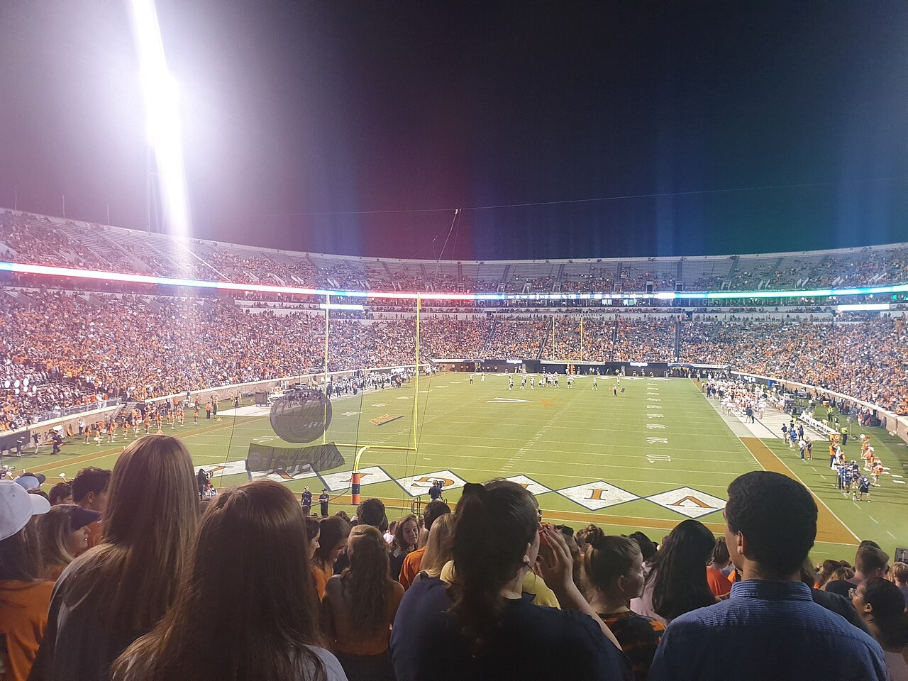 An American football game in progress at Scott Stadium